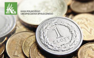 Logo KRUS na tle polskich monet.
