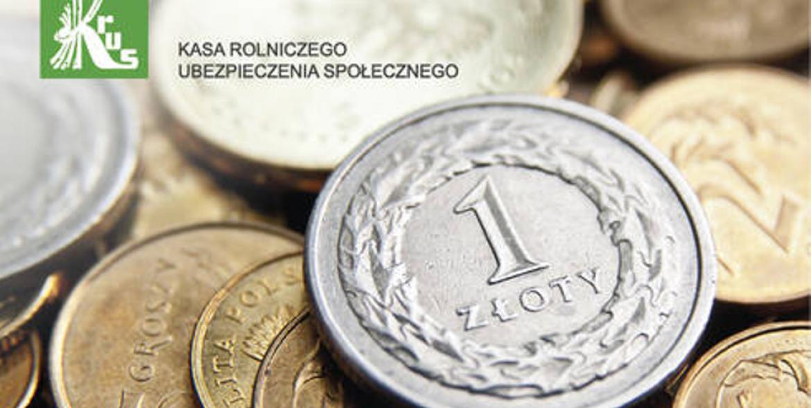 Logo KRUS na tle polskich monet.