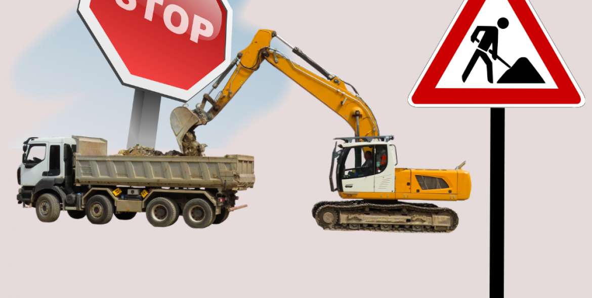 Sprzęt budowlany - cieżaówka i koparka oraz znak stop iuwaga roboty drogowe.